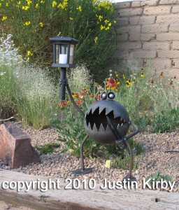 Metal gremlin with solar light